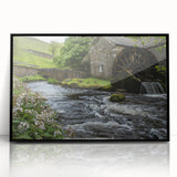 Framed acrylic wall art showcasing a serene watermill landscape design, featuring a black frame and a front view perspective, perfect for home decor.