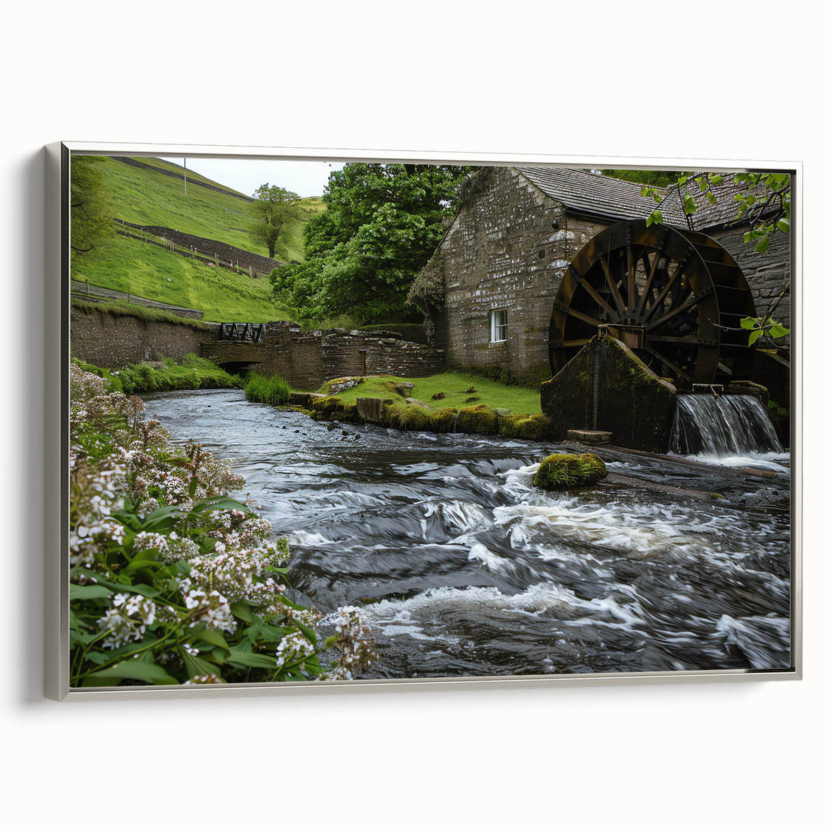 Framed canvas wall art showcasing a serene watermill landscape design with silver accents, ideal for home decor, set against a neutral background.