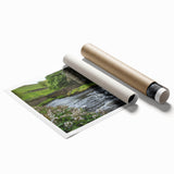 Rolled print of a scenic landscape featuring a tranquil watermill surrounded by lush greenery, ideal for home decor, available in a protective cardboard tube.