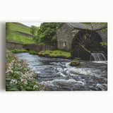 Stretched canvas wall art showcasing a serene landscape of watermills, featuring vibrant greens and blues, ideal for home decor and interior design.