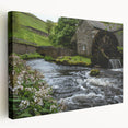 Stretched canvas wall art showcasing a serene watermill landscape, featuring vibrant colors and intricate details, perfect for enhancing home decor aesthetics.