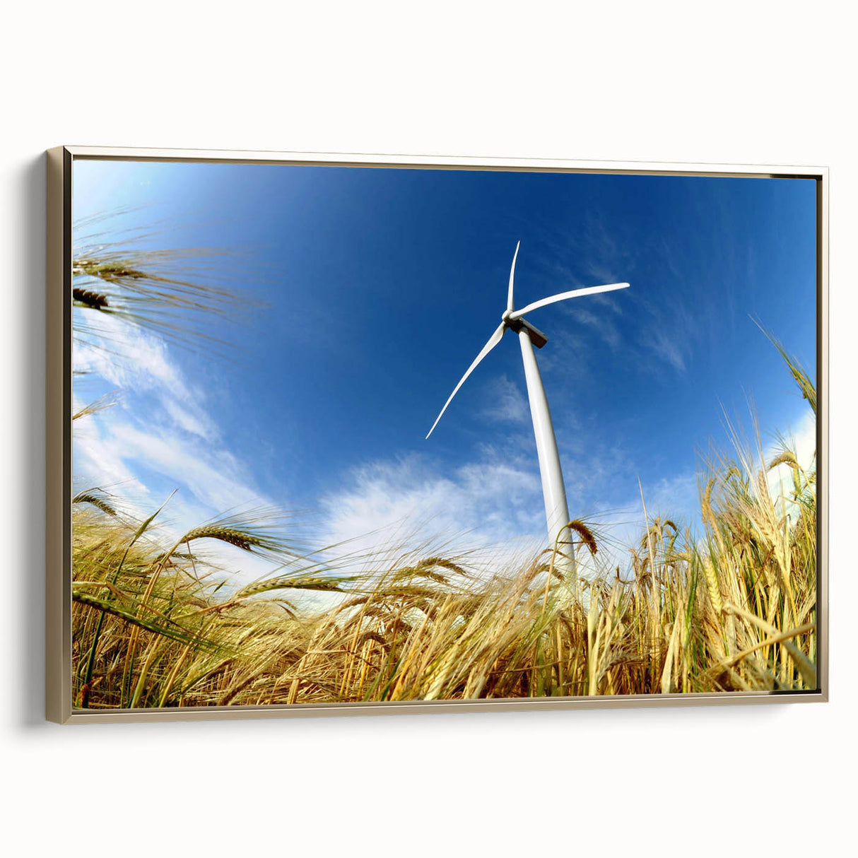 Framed canvas wall art showcasing a serene landscape with windmills, featuring a gold frame and side view, perfect for enhancing home decor with a touch of elegance.
