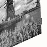 Close-up of a vibrant landscape wall art collection featuring striking windmill designs on acrylic glass, showcasing intricate details and vivid colors. Perfect for modern home decor.