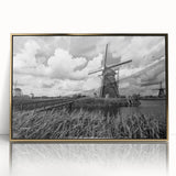 Framed wall art collection featuring a vibrant landscape with windmills, set against a golden background, ideal for enhancing modern home decor and aesthetics.