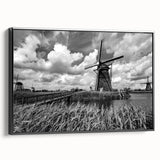 Framed canvas wall art showcasing a scenic landscape with windmills, designed in a modern style with a black frame, perfect for home decor.