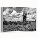 Framed canvas wall art showcasing a serene landscape with windmills, featuring soft colors and a modern design, ideal for home decor and aesthetic enhancement.