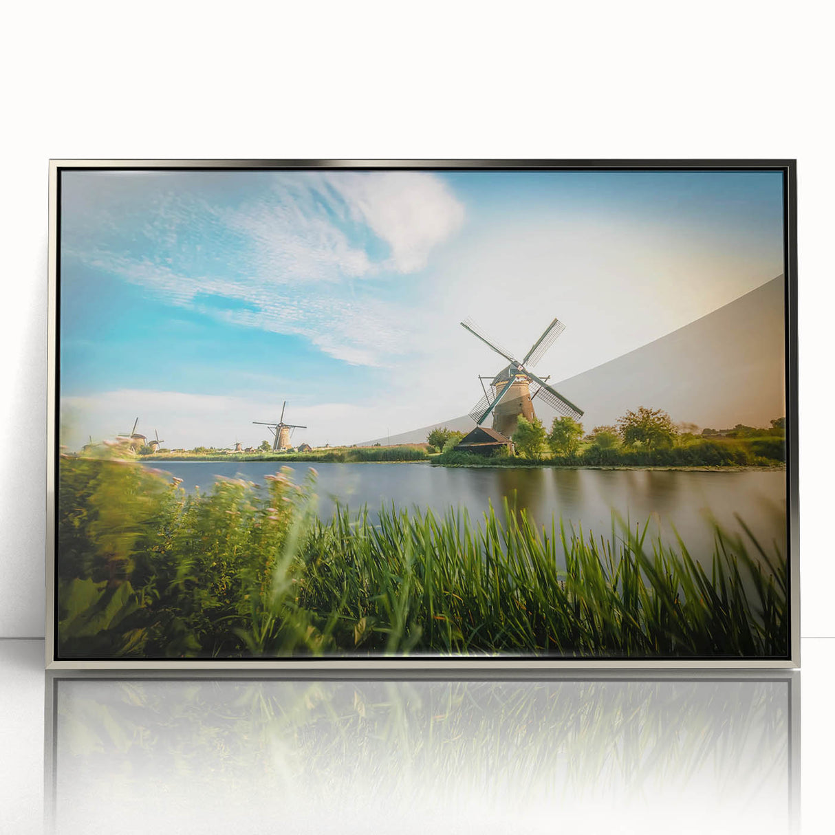 Framed wall art collection featuring a serene landscape with windmills, designed in an elegant silver frame, perfect for home decor enhancement.