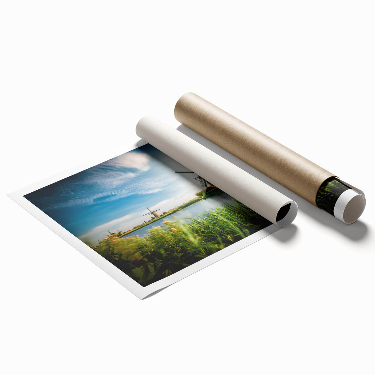 Rolled print showcasing a serene landscape with windmills, featuring soft pastel colors and detailed textures, perfect for home or office decor.