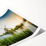 Landscape wall art print featuring vibrant windmills against a serene sky, rolled for easy transport and display, ideal for home or office decor.