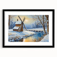 Framed wall art showcasing a scenic landscape with windmills, featuring a sleek black frame and mat, perfect for home decor and aesthetic enhancement.