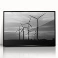 Framed wall art featuring a serene landscape with windmills, showcasing a black acrylic frame and vibrant colors, ideal for home decor and artistic ambiance.