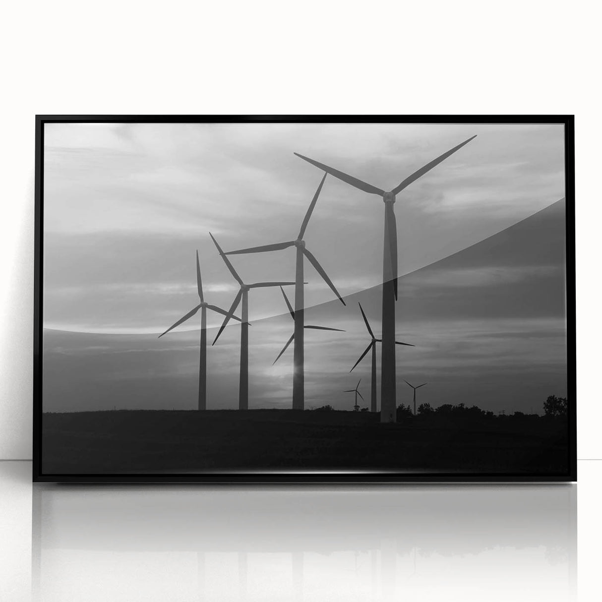 Framed wall art featuring a serene landscape with windmills, showcasing a black acrylic frame and vibrant colors, ideal for home decor and artistic ambiance.