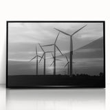Framed wall art featuring a serene landscape with windmills, showcasing a black acrylic frame and vibrant colors, ideal for home decor and artistic ambiance.