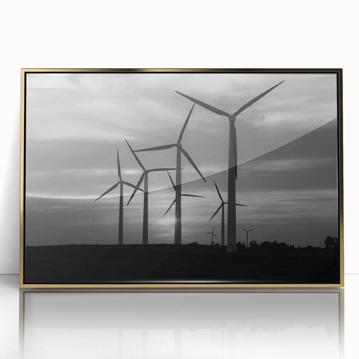 Framed wall art featuring a serene landscape with windmills, set against a gold-accented background, ideal for home decor and enhancing interior aesthetics.