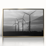 Framed wall art featuring a serene landscape with windmills, set against a gold-accented background, ideal for home decor and enhancing interior aesthetics.