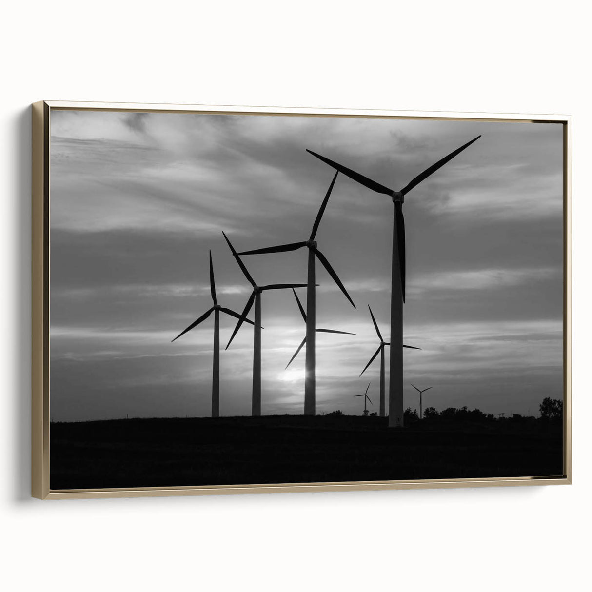 Framed canvas wall art featuring a scenic landscape with windmills, showcasing vibrant colors and a gold frame, perfect for adding a touch of elegance to home decor.