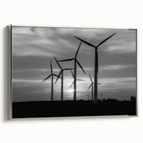 Framed canvas wall art featuring a serene landscape with windmills, set against a silver frame, showcasing a tranquil rural scene ideal for home decor.