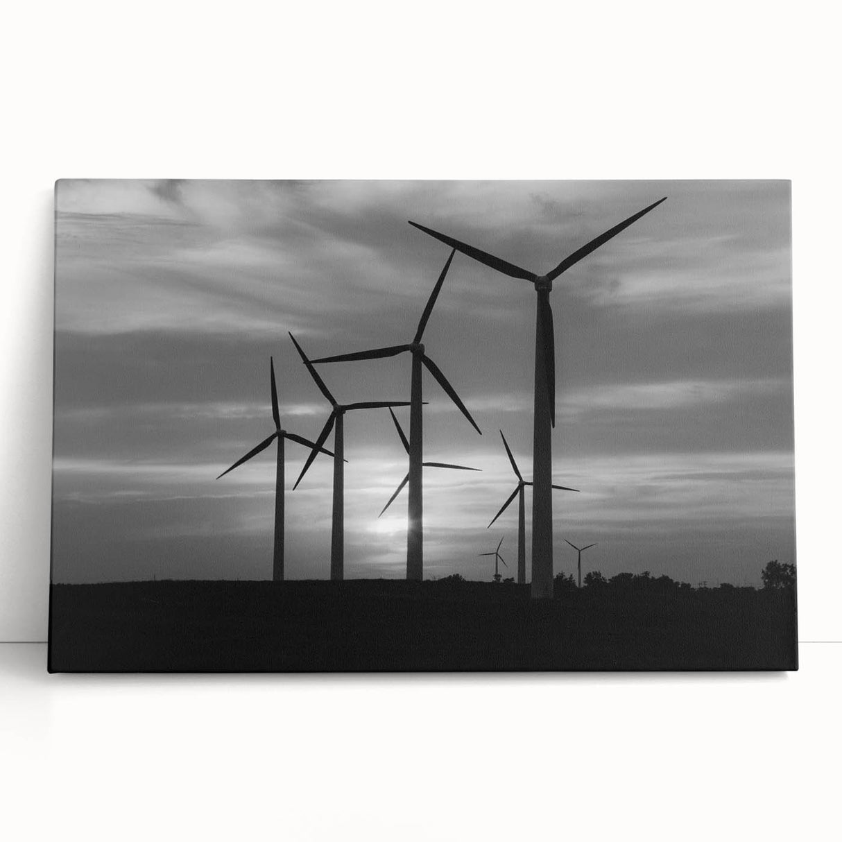 Stretched canvas art print showcasing a serene landscape with windmills, featuring vibrant colors and intricate details, perfect for home or office decor.