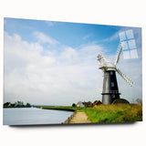 Acrylic glass wall art piece showcasing a vibrant landscape with windmills set against a colorful sunset, ideal for modern home decor. Perfect for enhancing interior spaces with a touch of nature and tranquility.