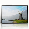 Framed acrylic wall art featuring a vibrant landscape with windmills, showcasing a black frame and a modern design, perfect for home decor enhancement.