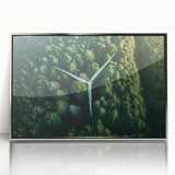 Framed wall art collection featuring a serene landscape with windmills, set in a sleek silver frame, showcasing vibrant colors and intricate details, perfect for home decor.