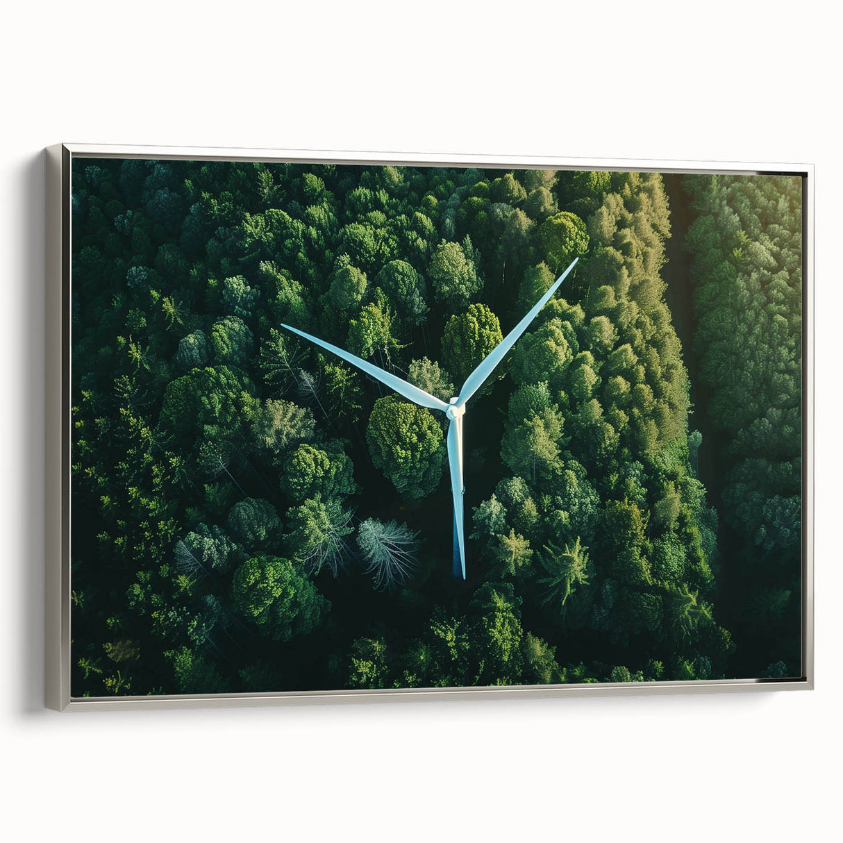 Framed canvas wall art showcasing a picturesque landscape of windmills against a serene sky, featuring a silver frame that enhances the artwork's elegance.