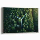 Framed canvas wall art showcasing a picturesque landscape of windmills against a serene sky, featuring a silver frame that enhances the artwork's elegance.