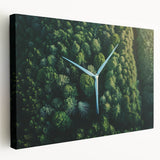 Stretched canvas wall art showcasing a serene landscape with windmills against a vibrant sunset, perfect for adding a tranquil ambiance to any room.