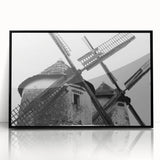 Framed acrylic wall art featuring a serene landscape with windmills, showcasing vibrant colors and intricate details, perfect for modern home decor.