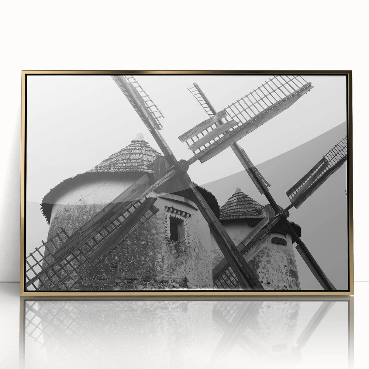 Framed wall art featuring a vibrant landscape with windmills, designed in gold accents, showcasing a scenic view perfect for home decor. Ideal for modern interiors.