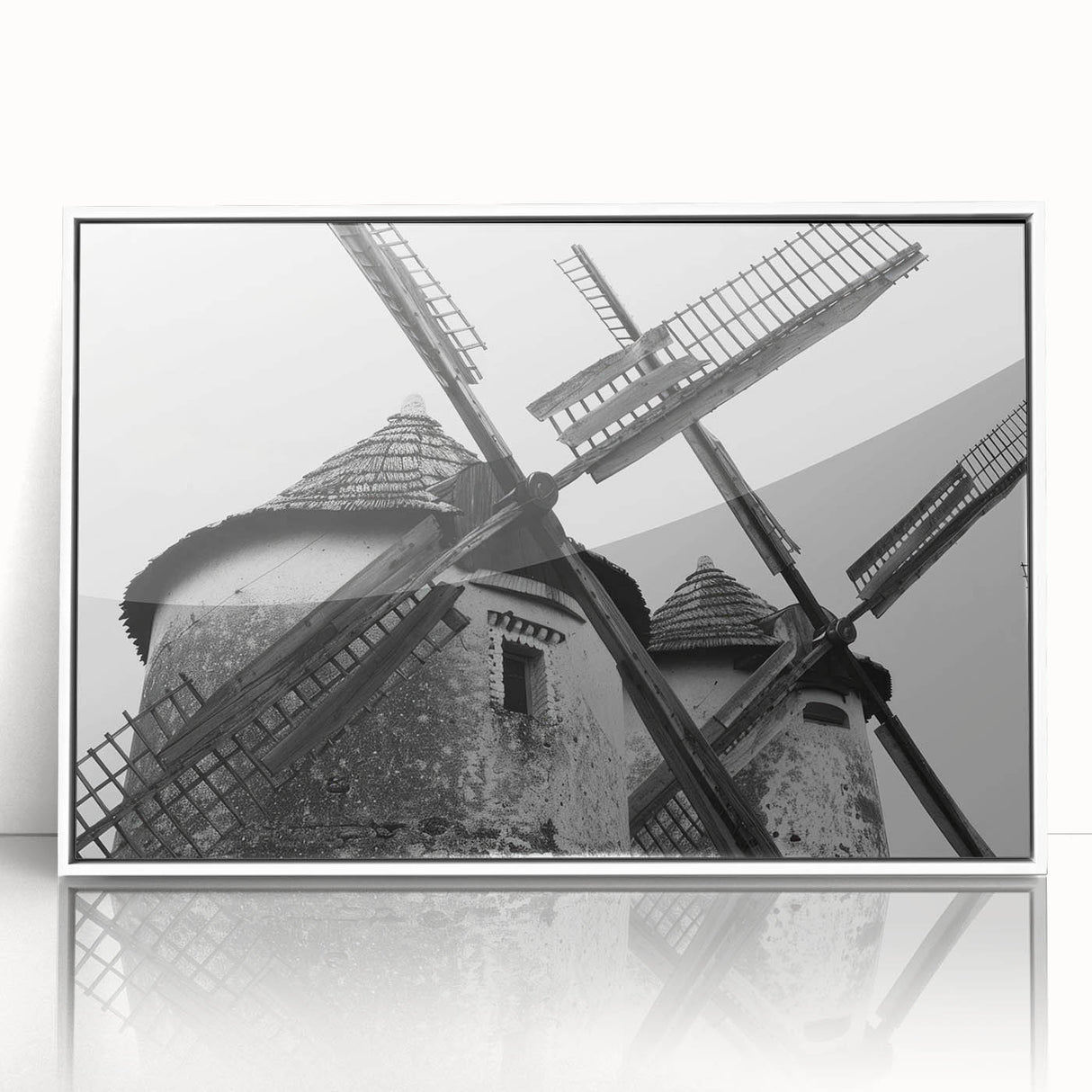 Framed acrylic wall art showcasing a serene landscape with windmills, set in a sleek white frame. Ideal for enhancing modern decor in living spaces.