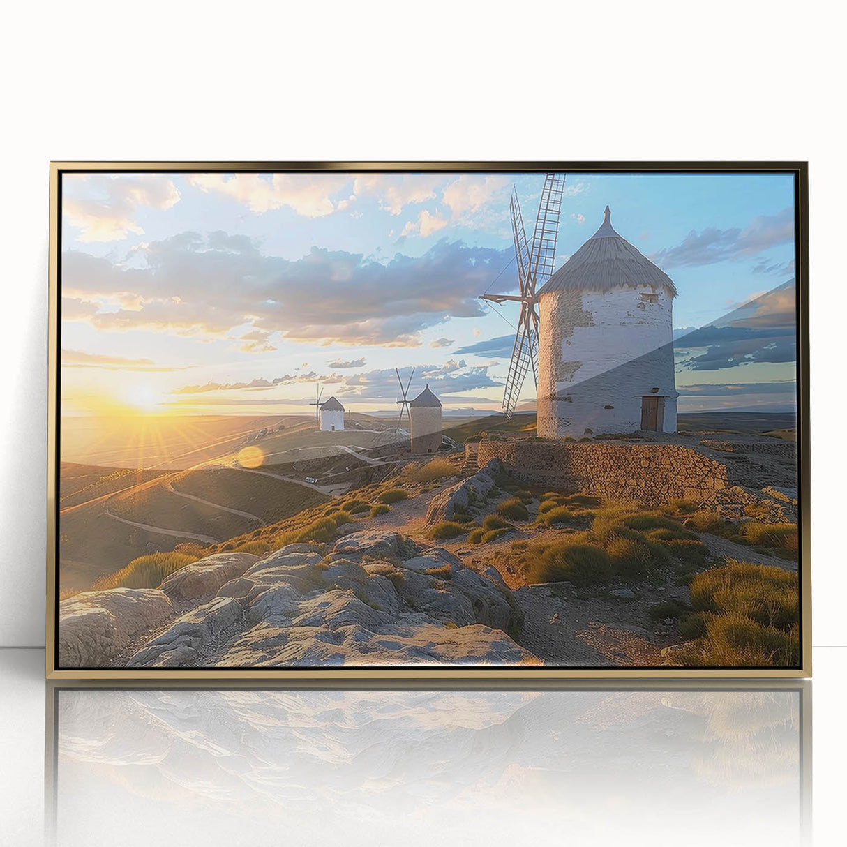 Framed wall art collection depicting a serene landscape with windmills, featuring a gold-accented frame, perfect for modern home décor. The vibrant colors and intricate details create a calming visual appeal, ideal for enhancing living spaces.