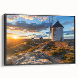 Framed canvas wall art showcasing a scenic landscape with windmills, featuring a sleek black frame and vibrant colors, ideal for enhancing modern home decor.