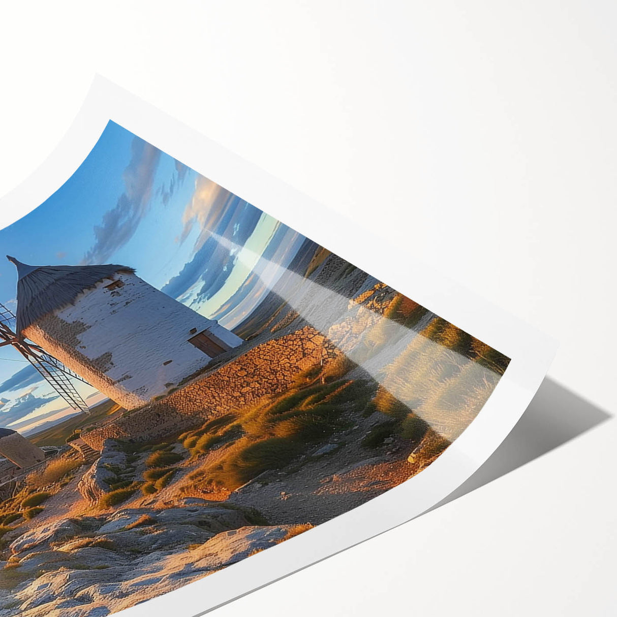 Rolled print showcasing a vibrant landscape with windmills against a sunset backdrop, designed for wall art decor. Ideal for enhancing home interiors.