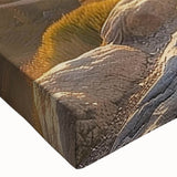 Close-up of a stretched canvas wall art piece featuring vibrant landscapes and traditional windmill designs, showcasing rich colors and intricate details, perfect for home decor.