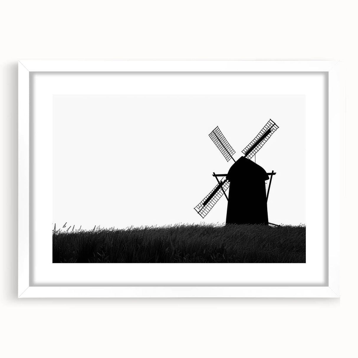 Framed wall art collection showcasing a serene landscape with windmills, featuring a white mat and sleek design, perfect for home decor and enhancing interior aesthetics.