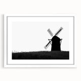 Framed wall art collection showcasing a serene landscape with windmills, featuring a white mat and sleek design, perfect for home decor and enhancing interior aesthetics.
