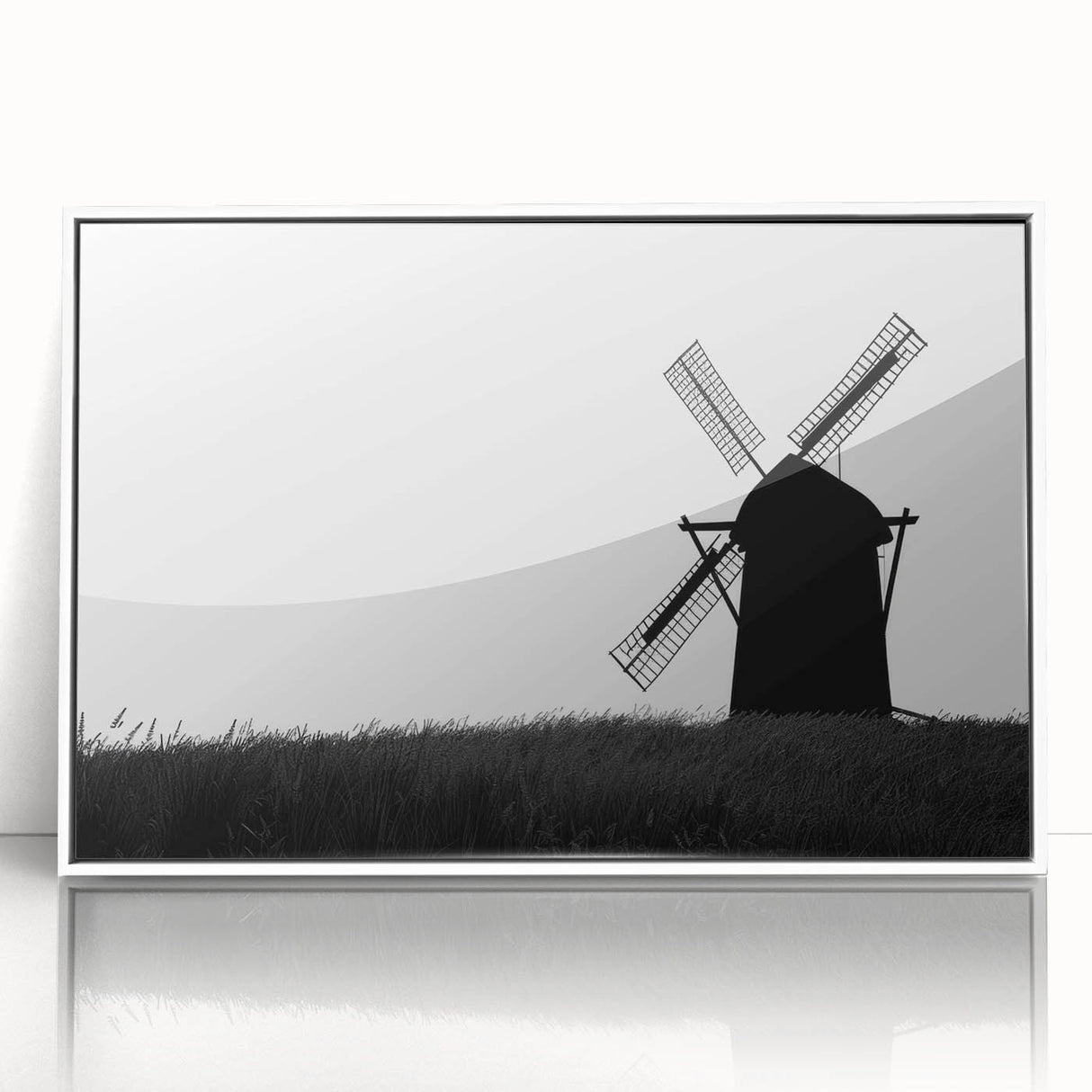 Framed acrylic wall art featuring a serene landscape with windmills, set against a vibrant sunset. The artwork is displayed in a white frame, enhancing its elegant design and perfect for modern home decor.