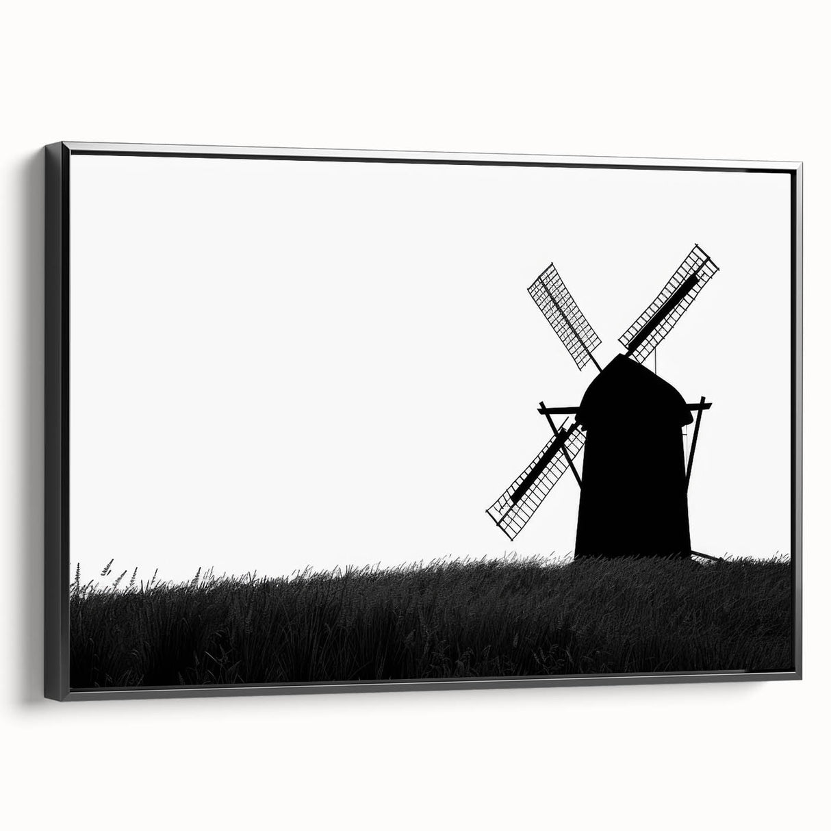 Framed canvas wall art showcasing a picturesque landscape with windmills, featuring a black frame and side view, perfect for home or office decor.