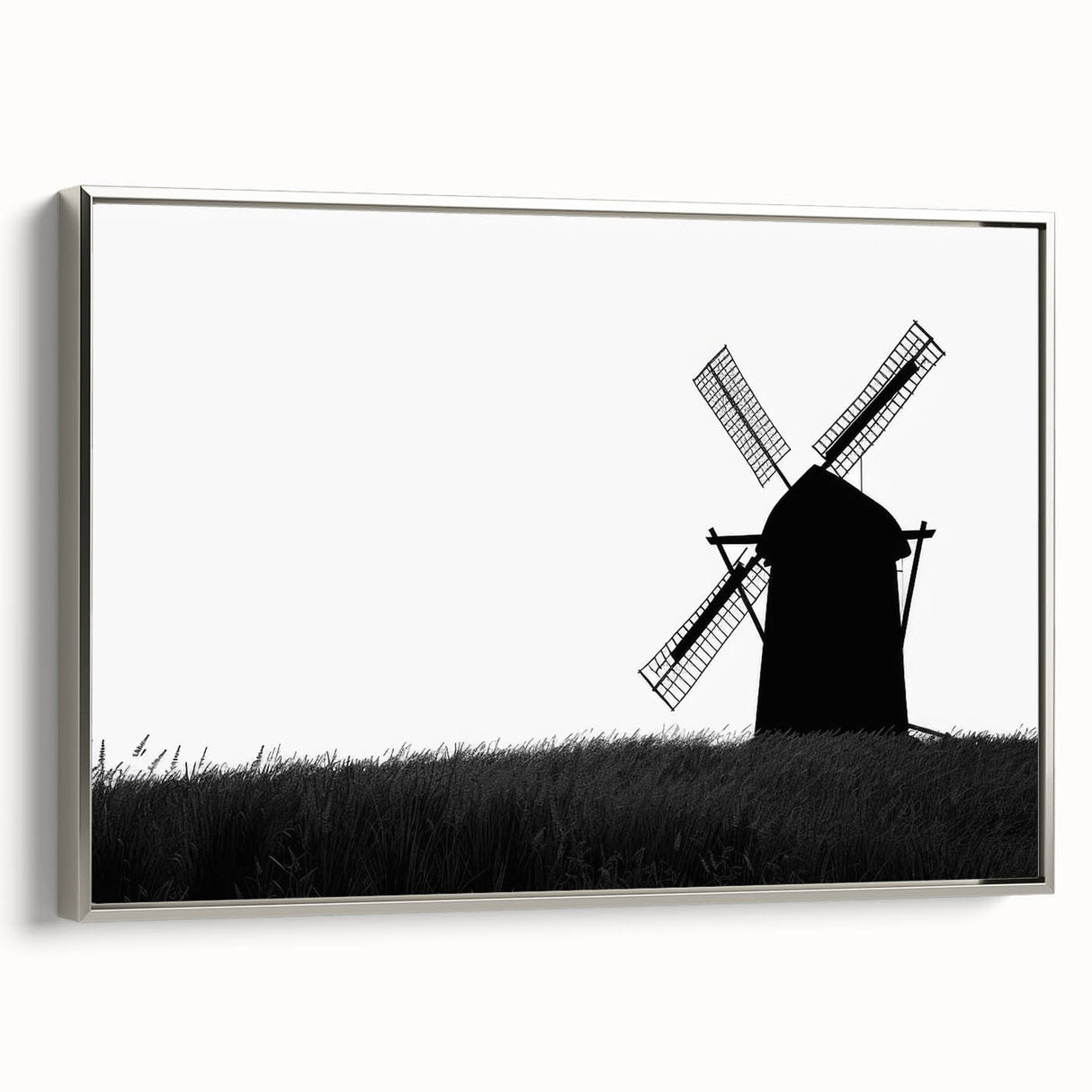 Framed wall art featuring a serene landscape with windmills, set against a vibrant sunset backdrop. The silver frame adds elegance, enhancing home decor appeal.