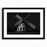 Framed wall art collection showcasing picturesque landscapes with windmills, featuring a sleek black frame and mat, ideal for enhancing modern home decor.