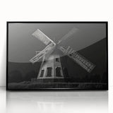 Framed acrylic wall art showcasing a beautiful landscape with windmills, featuring a sleek black frame and modern design, perfect for home decor.