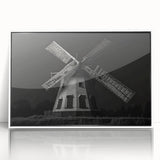 Framed wall art collection featuring vibrant windmill landscapes in various colors, showcasing a scenic countryside view with a white frame for modern decor.