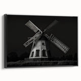Framed canvas wall art showcasing a vibrant windmill landscape design, featuring a black frame and side view, perfect for home decor enthusiasts.