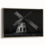 Framed canvas wall art showcasing a serene landscape with windmills, adorned in a gold frame, ideal for home decor and modern aesthetics. Perfect for enhancing interior spaces with a touch of elegance and tranquility.