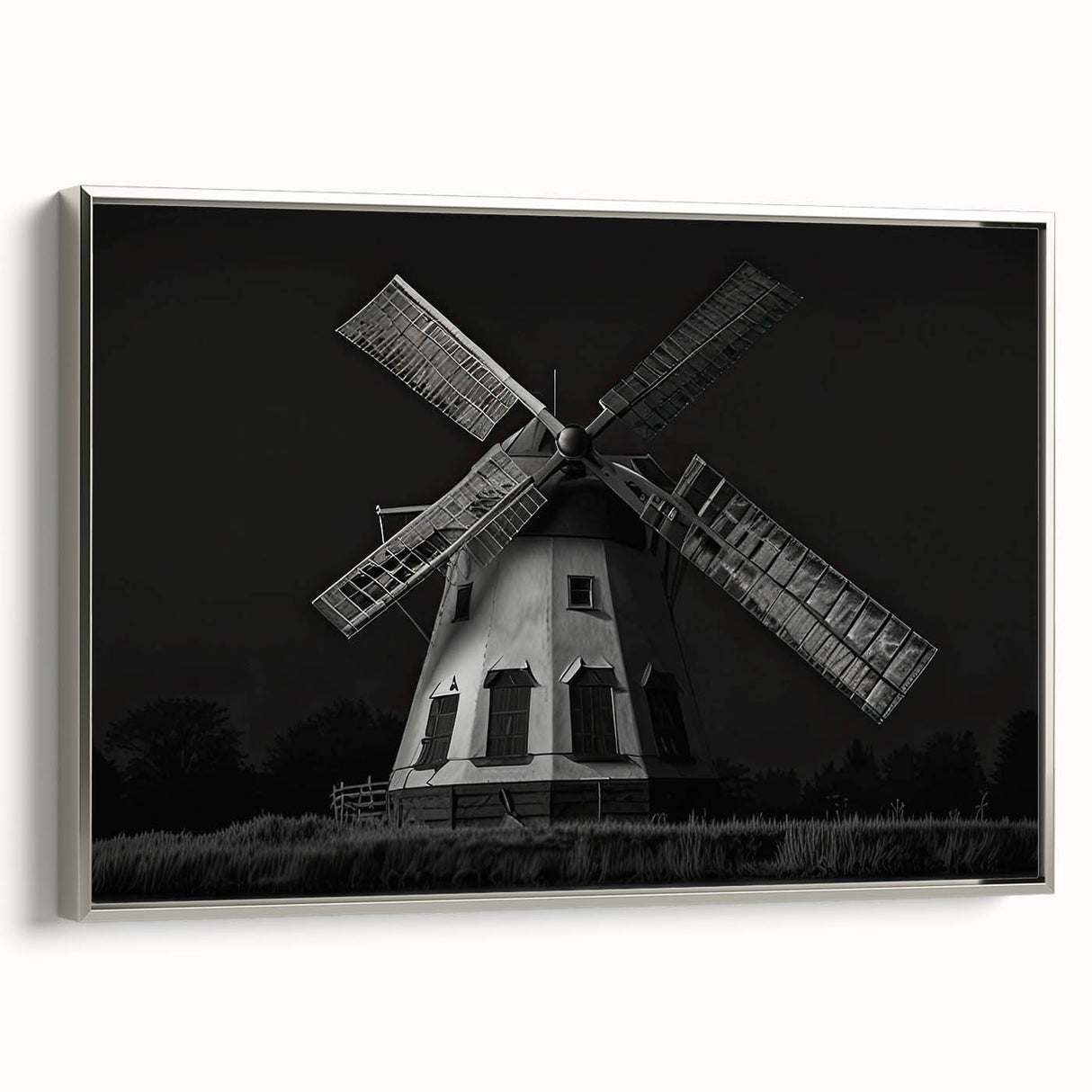 Framed canvas wall art showcasing a serene landscape with windmills, featuring a silver frame, perfect for home decor and enhancing interior aesthetics.
