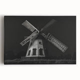 Stretched canvas wall art featuring a picturesque landscape with windmills under a bright blue sky, ideal for enhancing home decor and adding a serene ambiance.