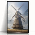 Framed wall art featuring a picturesque landscape with windmills, displayed in a sleek black frame, enhancing home or office decor with a serene touch.