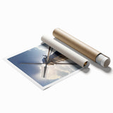 Vibrant rolled print showcasing a serene landscape with windmills under a bright blue sky, ideal for home decor enthusiasts seeking nature-inspired wall art.