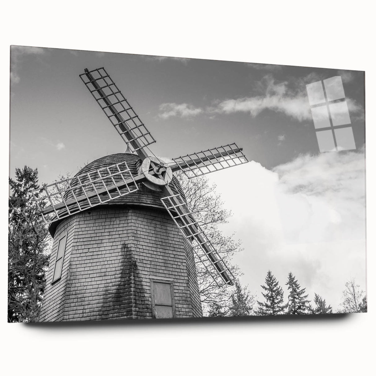 Acrylic glass wall art featuring a scenic landscape design with windmills, displayed from a side view, showcasing vibrant colors and intricate details, ideal for home decor.